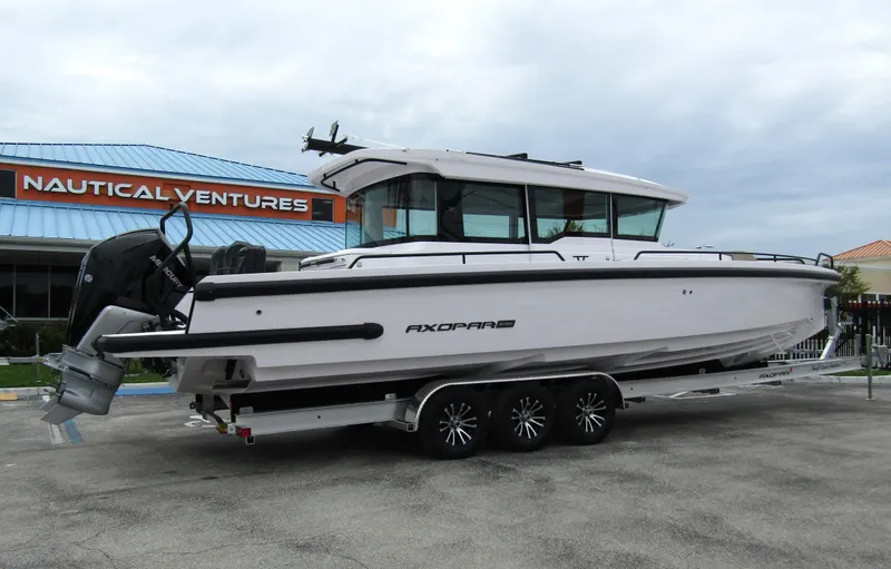 Slide: The Image of 2024 Axopar 37XC CROSS CABIN boat on trailer at Nautical Ventures. - 3