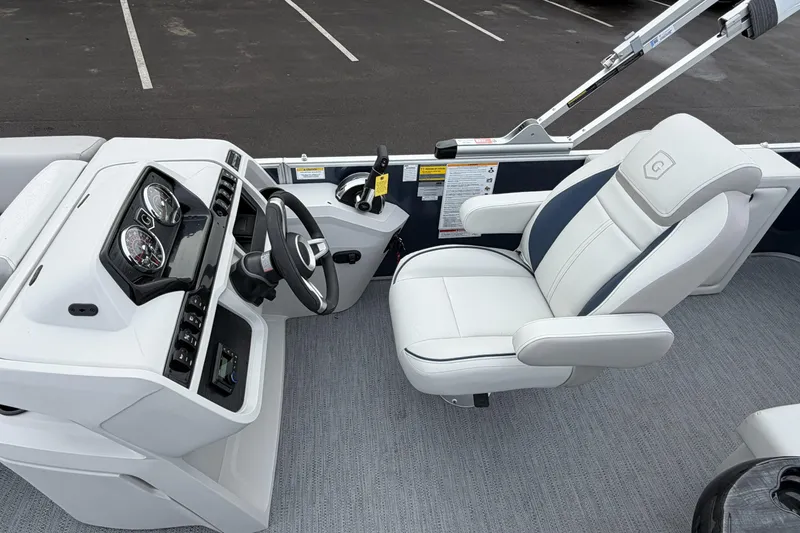 Slide: The Image of Captain's seat and helm of 2026 Godfrey Sweetwater 2086 C pontoon boat. - 15
