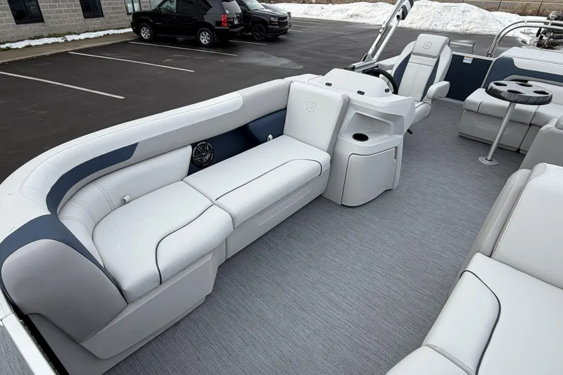Slide: The Image of Luxurious interior of 2026 Godfrey Sweetwater 2086 C pontoon boat with plush seating. - 8