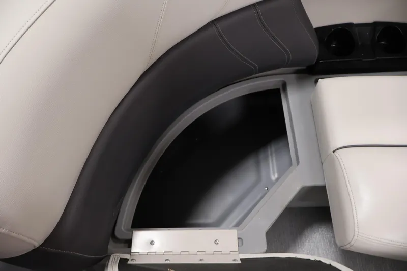 Slide: The Image of 2021 Sylvan 8522 Mirage boat interior storage compartment with cushioned seating. - 16