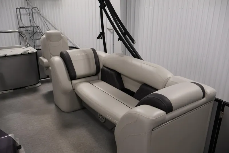 Slide: The Image of 2021 Sylvan 8522 Mirage boat interior with plush seating and modern design. - 29