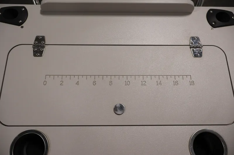 Slide: The Image of 2021 Sylvan 8522 Mirage boat hatch with ruler and cup holders. - 33