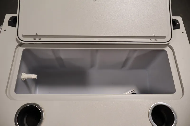 Slide: The Image of Open storage compartment on 2021 Sylvan 8522 Mirage boat with cup holders. - 34