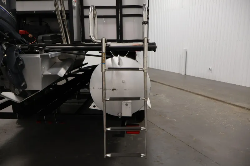 Slide: The Image of Rear view of 2021 Sylvan 8522 Mirage boat with ladder and motor. - 36