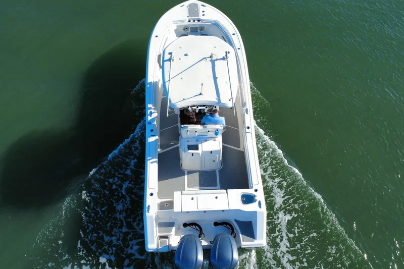 Slide: The Image of Aerial view of 2020 Tidewater 280 CC Adventure boat cruising on water. - 3