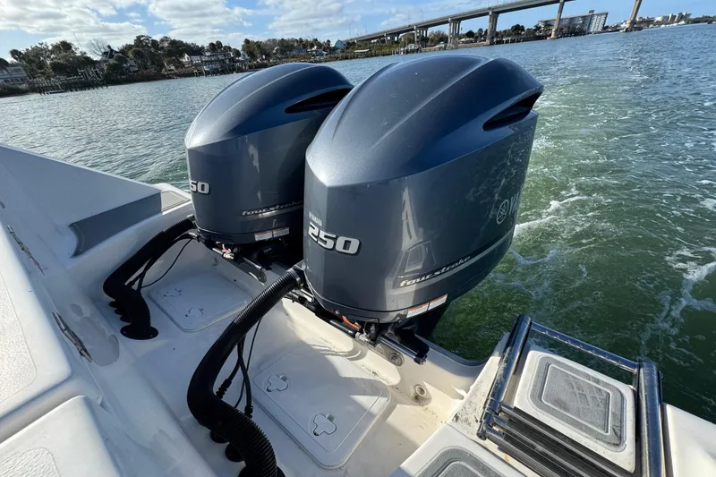 Slide: The Image of Tidewater 280 CC Adventure 2020 with dual Yamaha 250 outboard engines on water. - 31