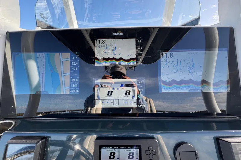 Slide: The Image of Dashboard of 2020 Tidewater 280 CC Adventure with navigation and sonar displays. - 37