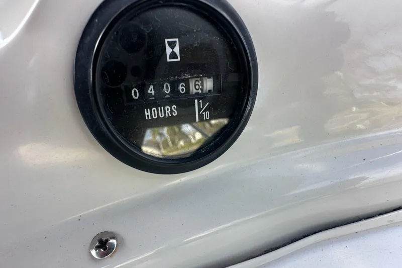 Slide: The Image of Hour meter reading 4066 on 2004 Vectra S-215 dashboard. - 14