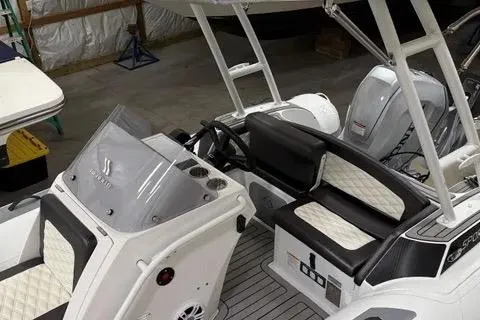 Slide: The Image of 2024 Highfield Sport 520 boat interior with sleek seating and modern console design. - 1