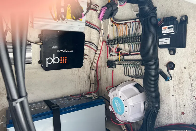 Slide: The Image of Electrical system setup in a 2011 Renegade OF 23 with PowerBass components. - 22