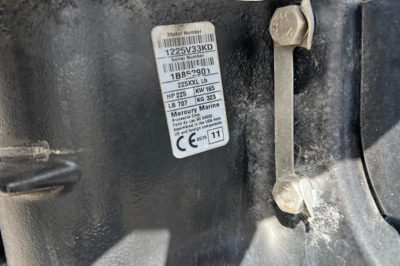 Slide: The Image of Label on Renegade OF 23, 2011 model, displaying specifications and serial number. - 26