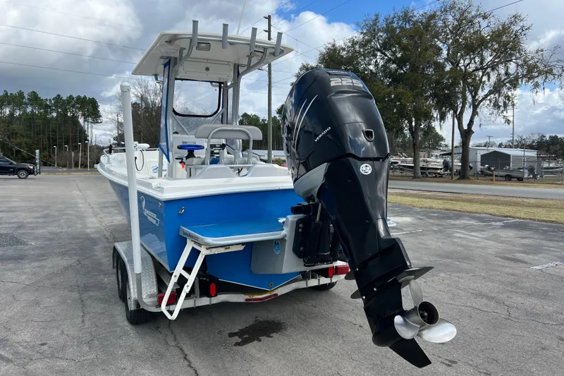 Slide: The Image of 2011 Renegade OF 23 boat with powerful outboard motor on trailer. - 7