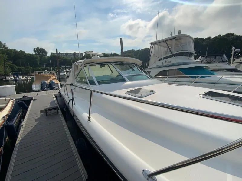 Slide: The Image of 2002 Tiara Yachts 3500 Open at dock, sunny day. - 26