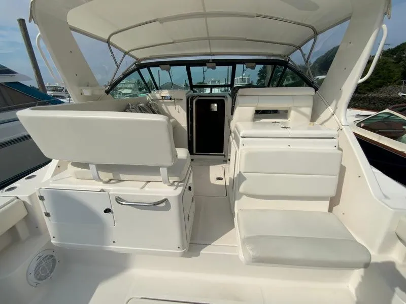 Slide: The Image of Interior of a 2002 Tiara Yachts 3500 Open with white seating. - 28