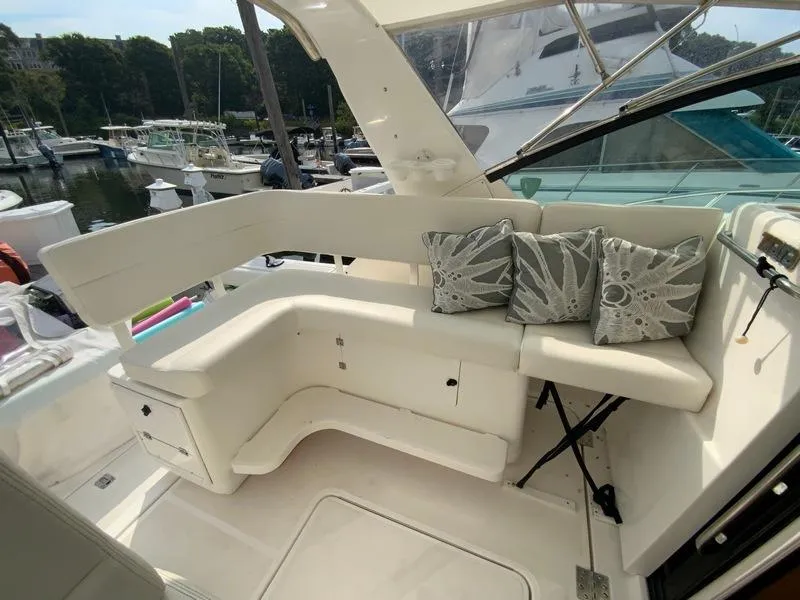 Slide: The Image of Interior of a 2002 Tiara Yachts 3500 Open with seating area. - 30