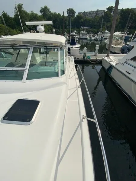 Slide: The Image of 2002 Tiara Yachts 3500 Open docked at marina. - 38