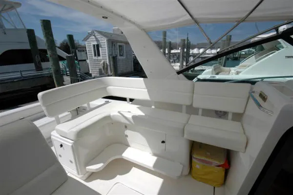 Slide: The Image of Interior of a 2002 Tiara Yachts 3500 Open, white upholstery. - 4