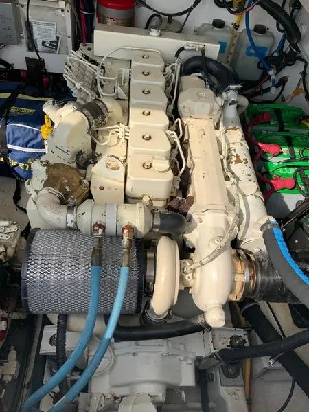 Slide: The Image of Engine room of a 2002 Tiara Yachts 3500 Open with visible engine. - 43