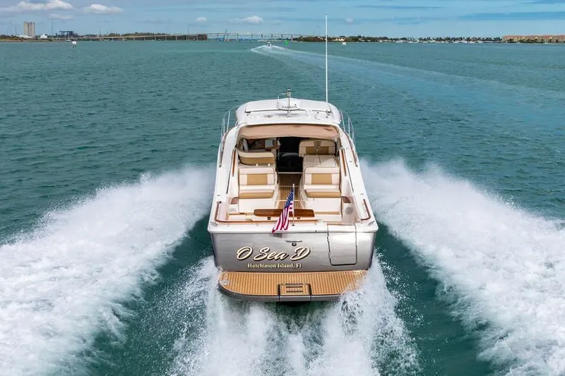 Slide: The Image of 2013 Tiara Yachts 3600 Coronet cruising on open water, rear view. - 42
