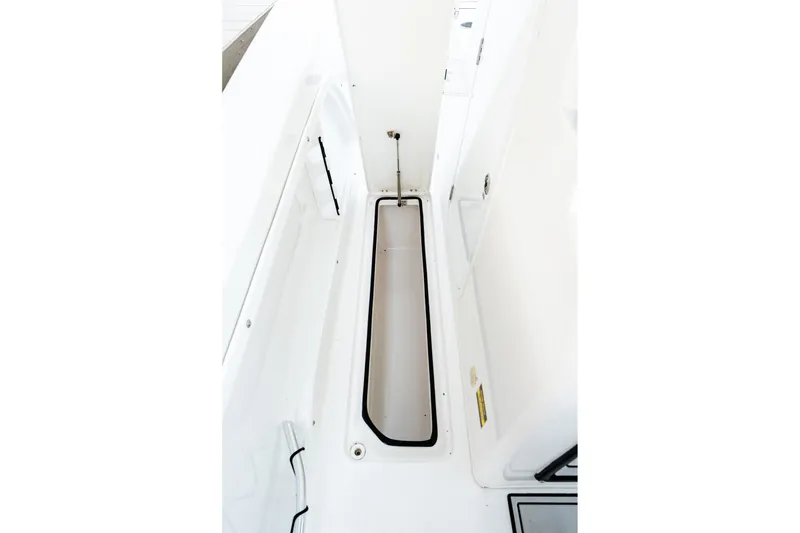 Slide: The Image of 2023 Twin Vee 260 GFX CC boat interior storage compartment. - 43