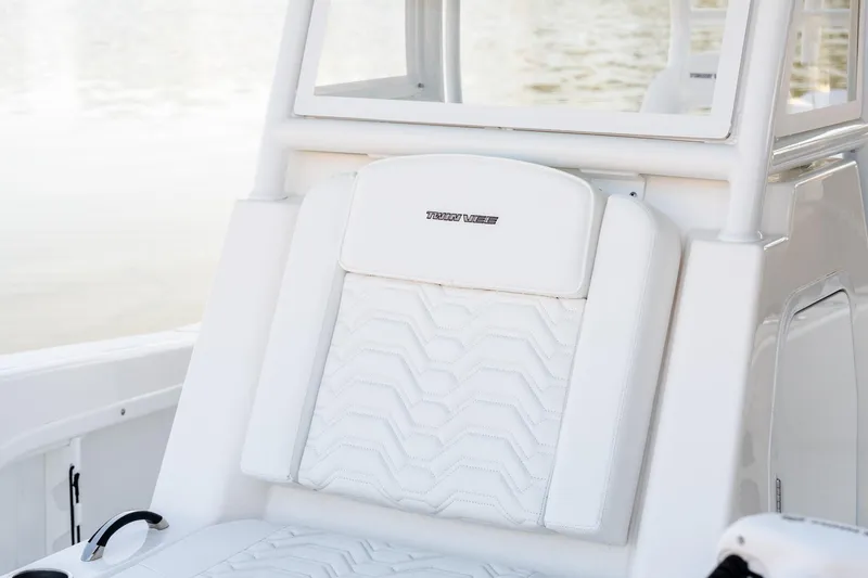 Slide: The Image of 2023 Twin Vee 260 GFX CC boat seat with elegant white upholstery. - 47