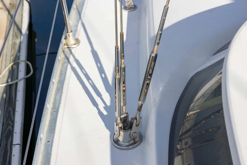 Slide: The Image of Deck rigging of 2001 Jeanneau Sun Odyssey 43 DS sailboat, showcasing stainless steel fittings. - 10