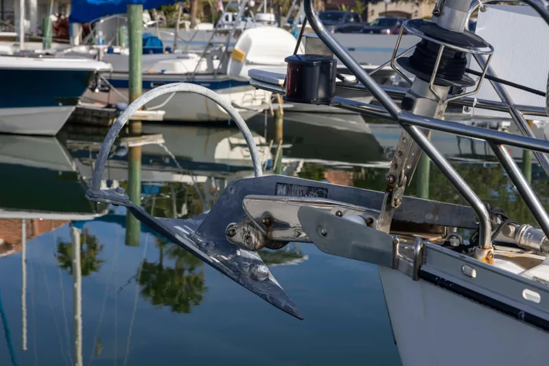 Slide: The Image of Jeanneau Sun Odyssey 43 DS 2001 sailboat anchor detail in marina setting. - 18