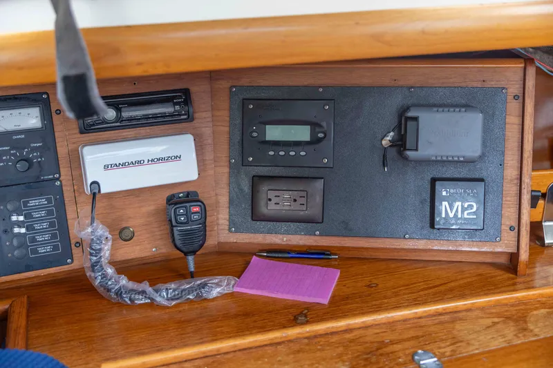 Slide: The Image of Control panel of 2001 Jeanneau Sun Odyssey 43 DS sailboat with navigation and communication equipment. - 29