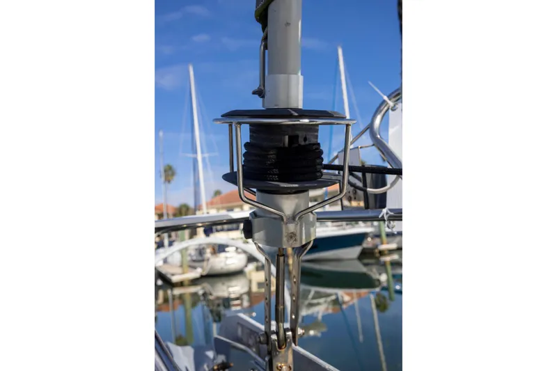 Slide: The Image of Close-up of Jeanneau Sun Odyssey 43 DS sailboat rigging, 2001 model, in a marina setting. - 8