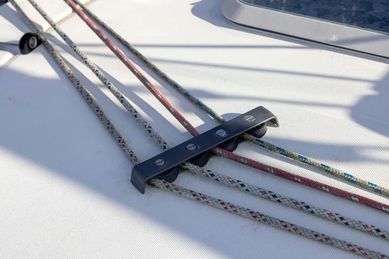 Slide: The Image of Rope rigging on Jeanneau Sun Odyssey 43 DS sailboat deck, 2001 model. - 9