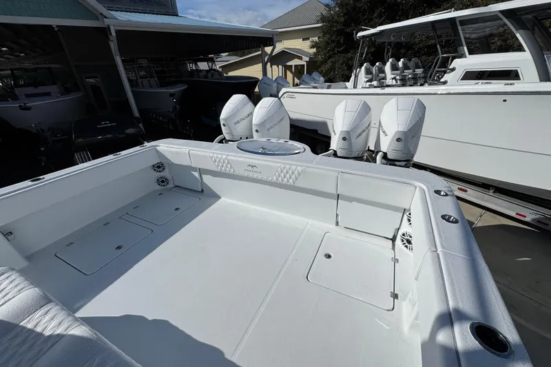 Slide: The Image of 2026 Invincible 36 Catamaran with Mercury engines, spacious deck, and modern design. - 41