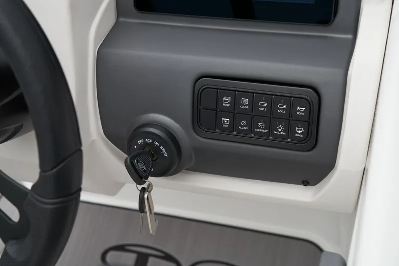 Slide: The Image of Manufacturer Provided Image: 2025 Tahoe T21 dashboard with ignition key and control panel. - 34