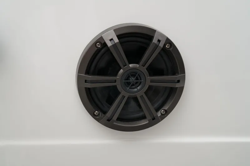 Slide: The Image of Manufacturer Provided Image: 2025 Tahoe T21 boat speaker, black and gray, mounted on white surface. - 42