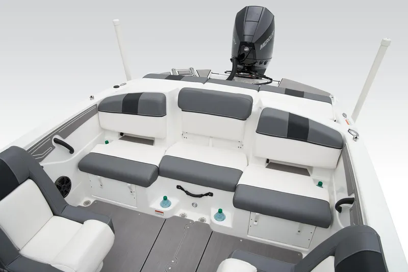 Slide: The Image of Manufacturer Provided Image: 2025 Tahoe T21 boat interior with gray and white seating, featuring a powerful outboard motor. - 44