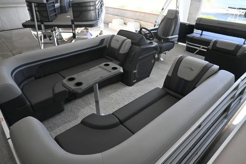 Slide: The Image of Luxurious interior of 2026 Bennington S Swingback 23 SSB pontoon boat with plush seating. - 6