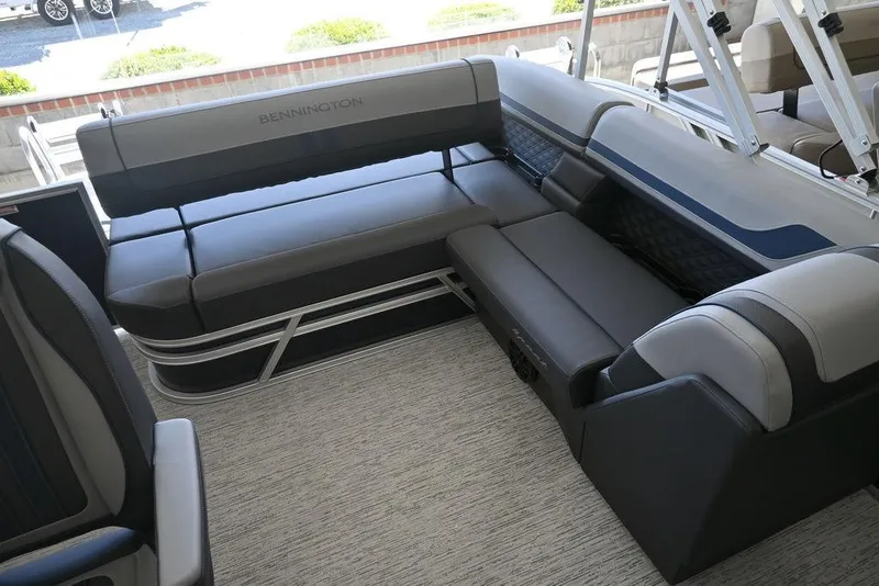 Slide: The Image of 2026 Bennington S Swingback 23 SSB boat interior with luxurious seating and modern design. - 7