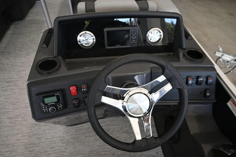 The Image of Dashboard of 2026 Bennington S Swingback 23 SSB with modern controls and steering wheel. - 8