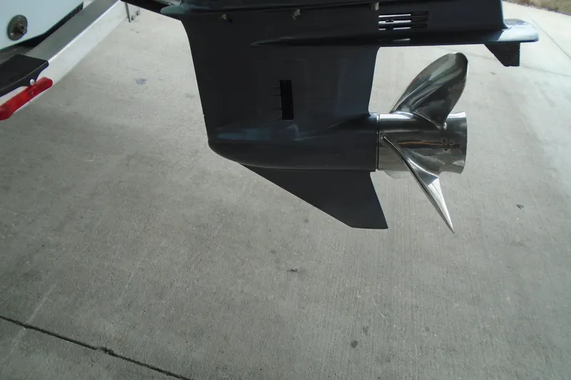 Slide: The Image of 2021 Robalo R202 Explorer boat propeller on concrete surface. - 14