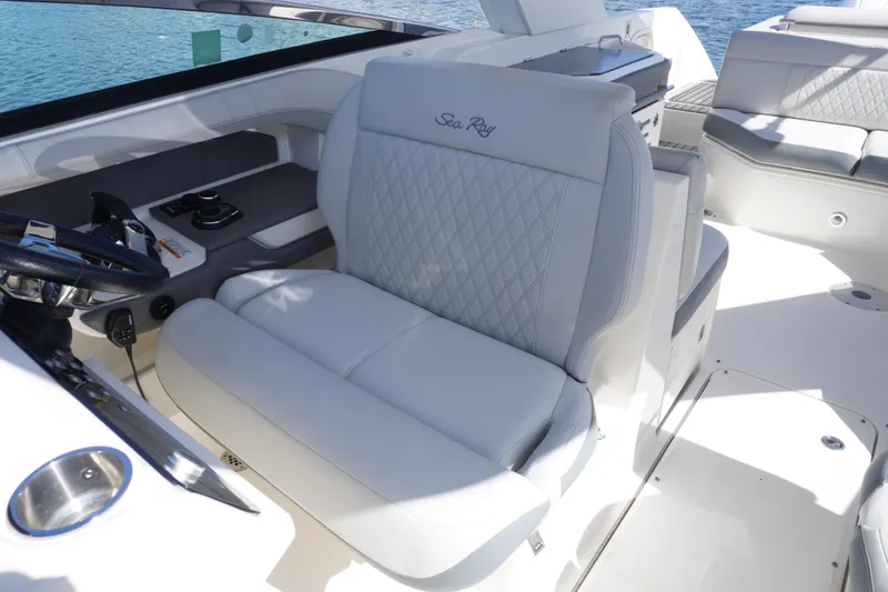Slide: The Image of Luxurious interior of 2020 Sea Ray SLX 310 Outboard boat with plush seating. - 10