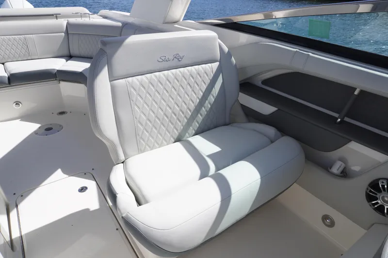 Slide: The Image of Luxurious seating on 2020 Sea Ray SLX 310 Outboard boat, featuring elegant design and comfort. - 11