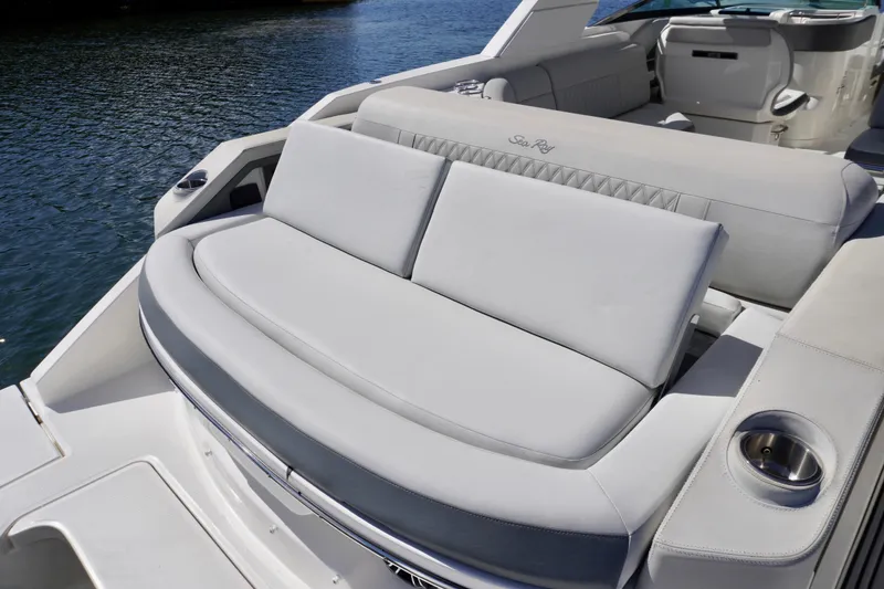Slide: The Image of Luxurious seating on 2020 Sea Ray SLX 310 Outboard boat, featuring elegant design and comfort. - 18