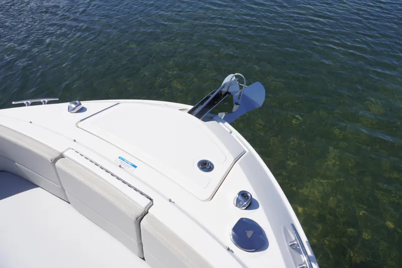 Slide: The Image of Bow of 2020 Sea Ray SLX 310 Outboard on clear water. - 22