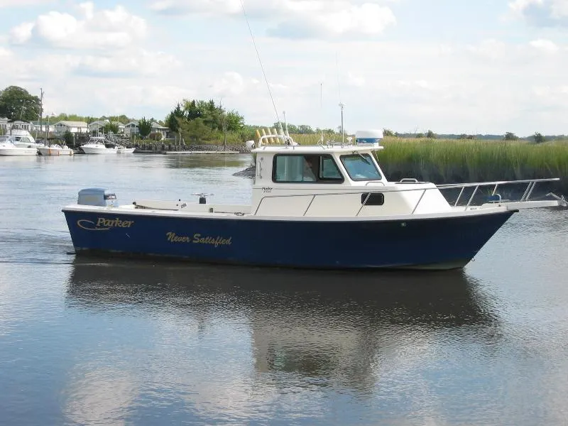 Slide: The Image of Parker Marine 2520 Sport Cabin 1999 - 0