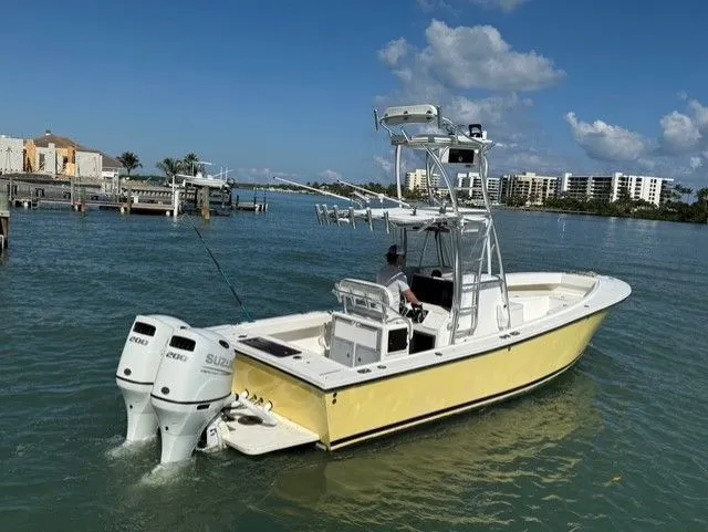 Slide: The Image of 2004 Regulator 26 Center Console boat on the water. - 10