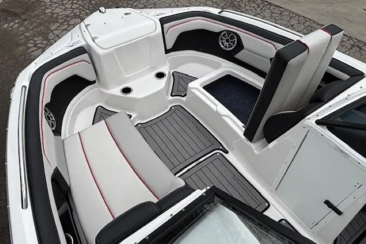 Slide: The Image of 2018 Yamaha Boats 212X interior with sleek seating and modern design. - 10