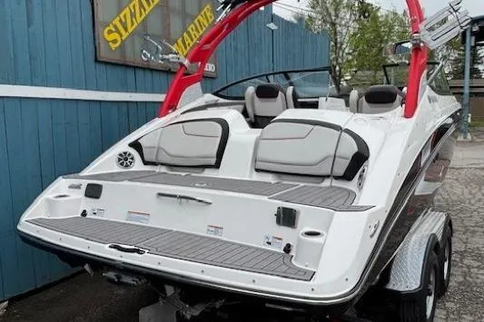 Slide: The Image of 2018 Yamaha Boats 212X with red accents, displayed at Sizzle Marine dealership. - 3