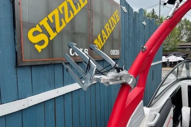 Slide: The Image of 2018 Yamaha Boats 212X with red wakeboard tower at Sizzle Marine dealership. - 36