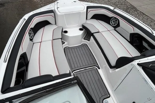 Slide: The Image of 2018 Yamaha Boats 212X interior with sleek seating and modern design. - 8
