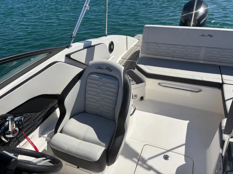 Slide: The Image of Interior of 2024 Sea Ray SPX 210 Outboard on the water. - 11