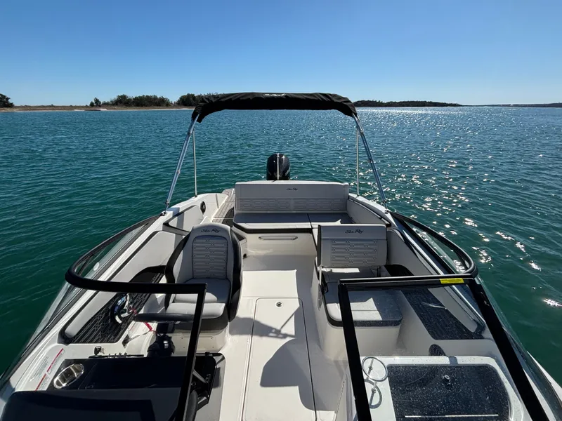 Slide: The Image of 2024 Sea Ray SPX 210 Outboard on calm waters. - 13